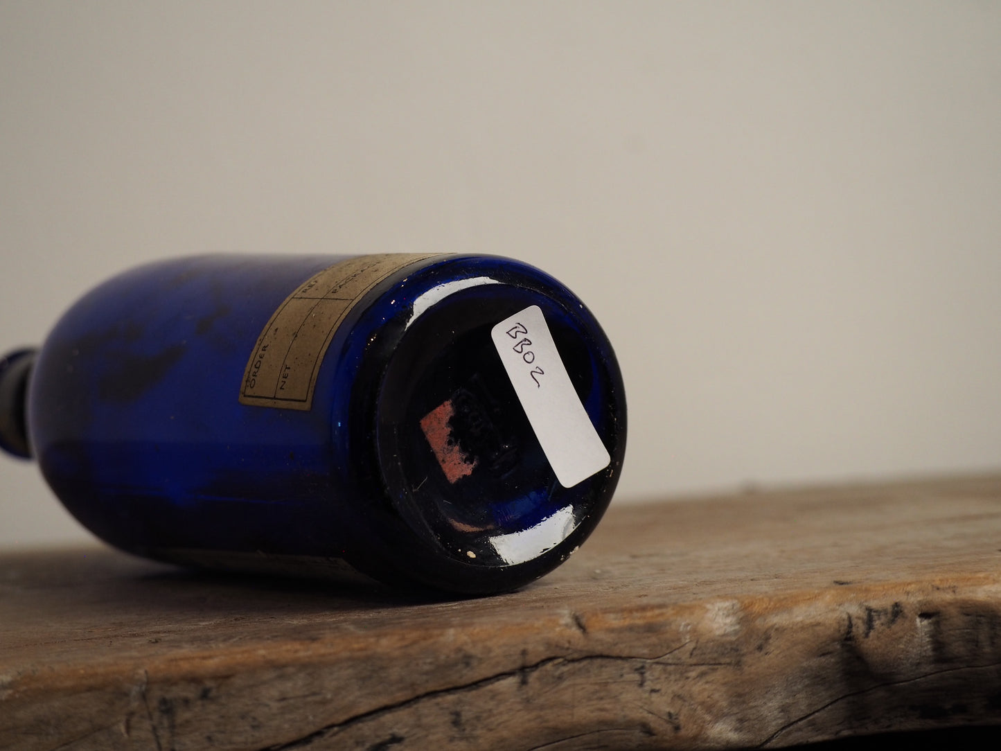 Antique Victorian Blue Glass Bottle with Stopper and Original Label