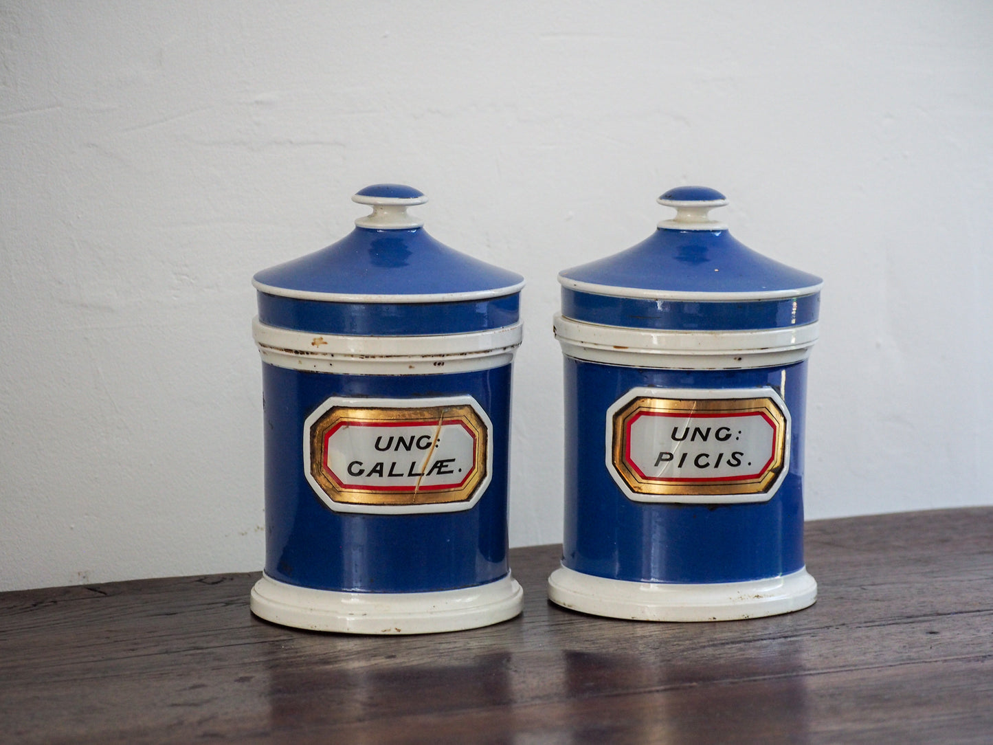 Pair of Vintage / Antique Blue Porcelain Apothecary Chemist Bottles With Original Labels and Lids