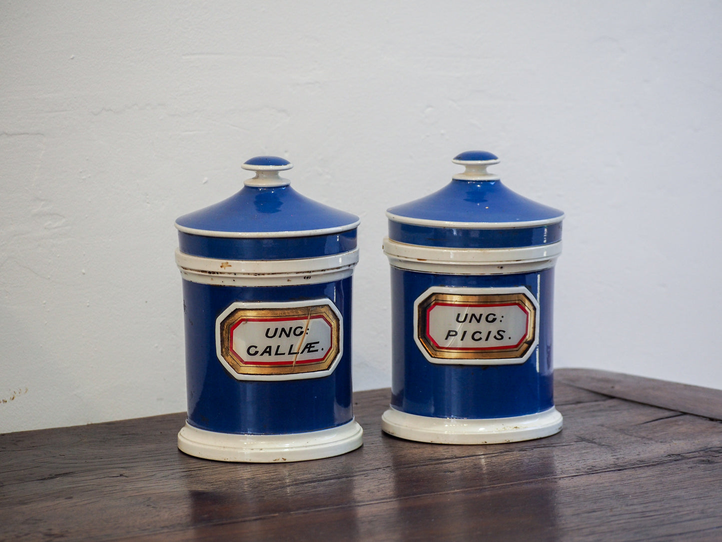 Pair of Vintage / Antique Blue Porcelain Apothecary Chemist Bottles With Original Labels and Lids