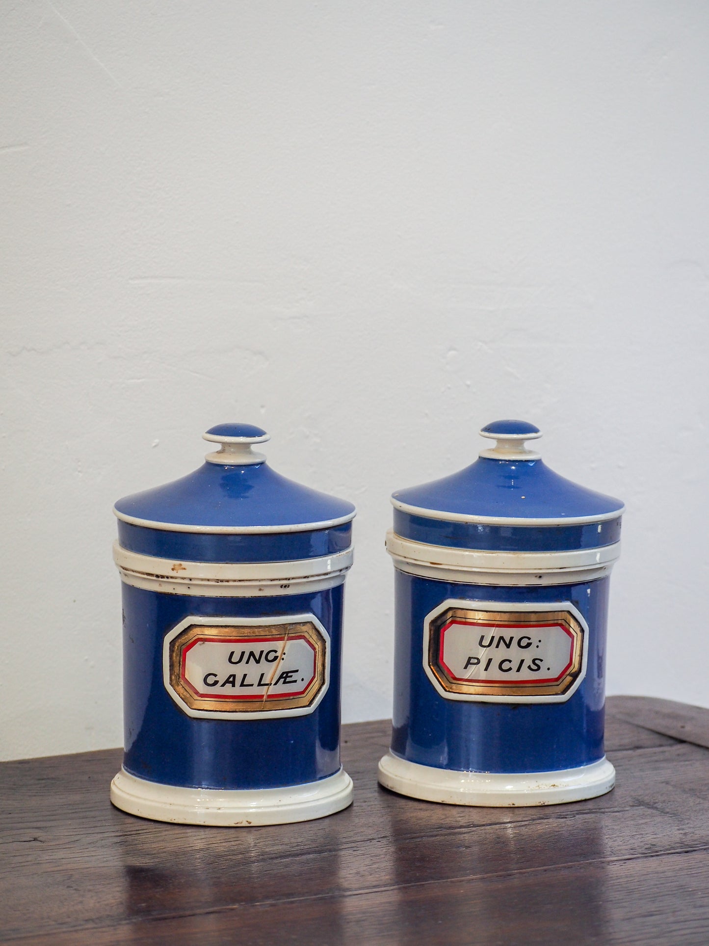 Pair of Vintage / Antique Blue Porcelain Apothecary Chemist Bottles With Original Labels and Lids