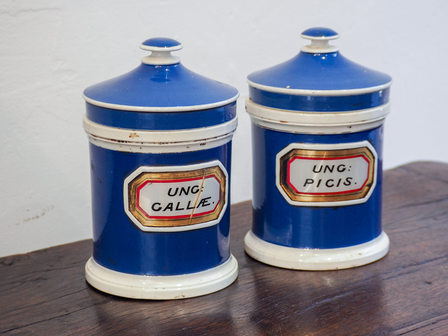 Pair of Vintage / Antique Blue Porcelain Apothecary Chemist Bottles With Original Labels and Lids
