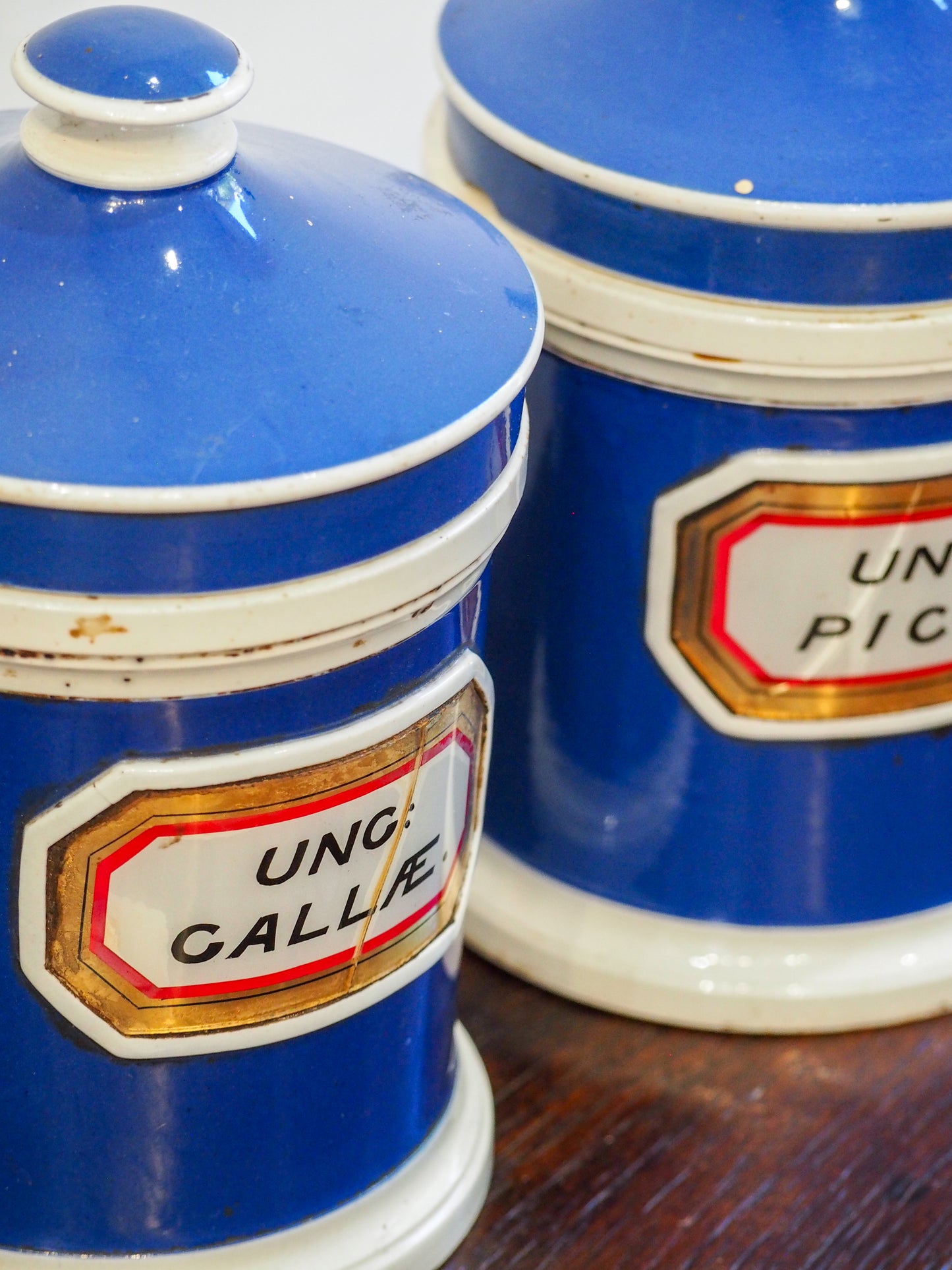Pair of Vintage / Antique Blue Porcelain Apothecary Chemist Bottles With Original Labels and Lids