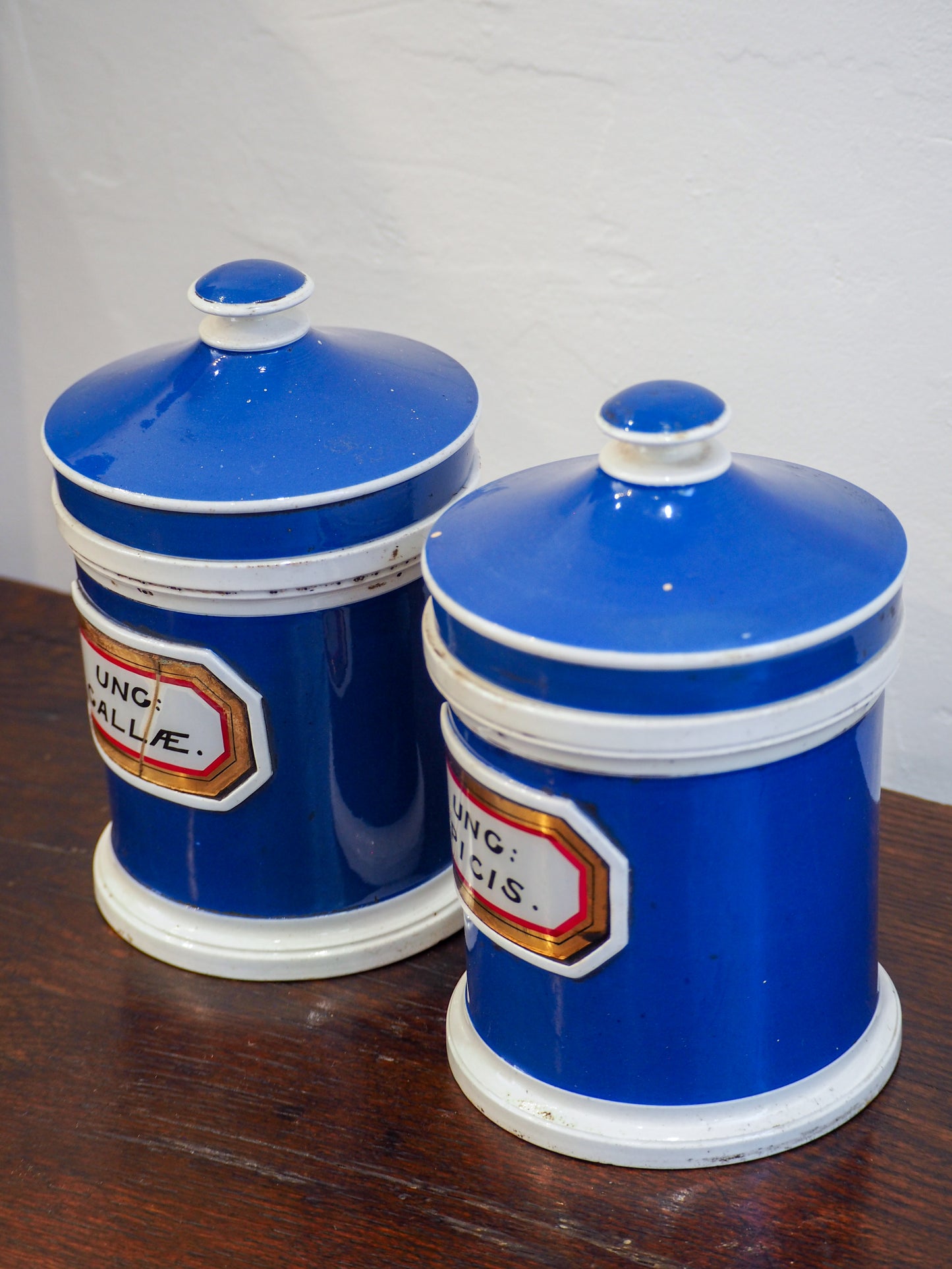 Pair of Vintage / Antique Blue Porcelain Apothecary Chemist Bottles With Original Labels and Lids