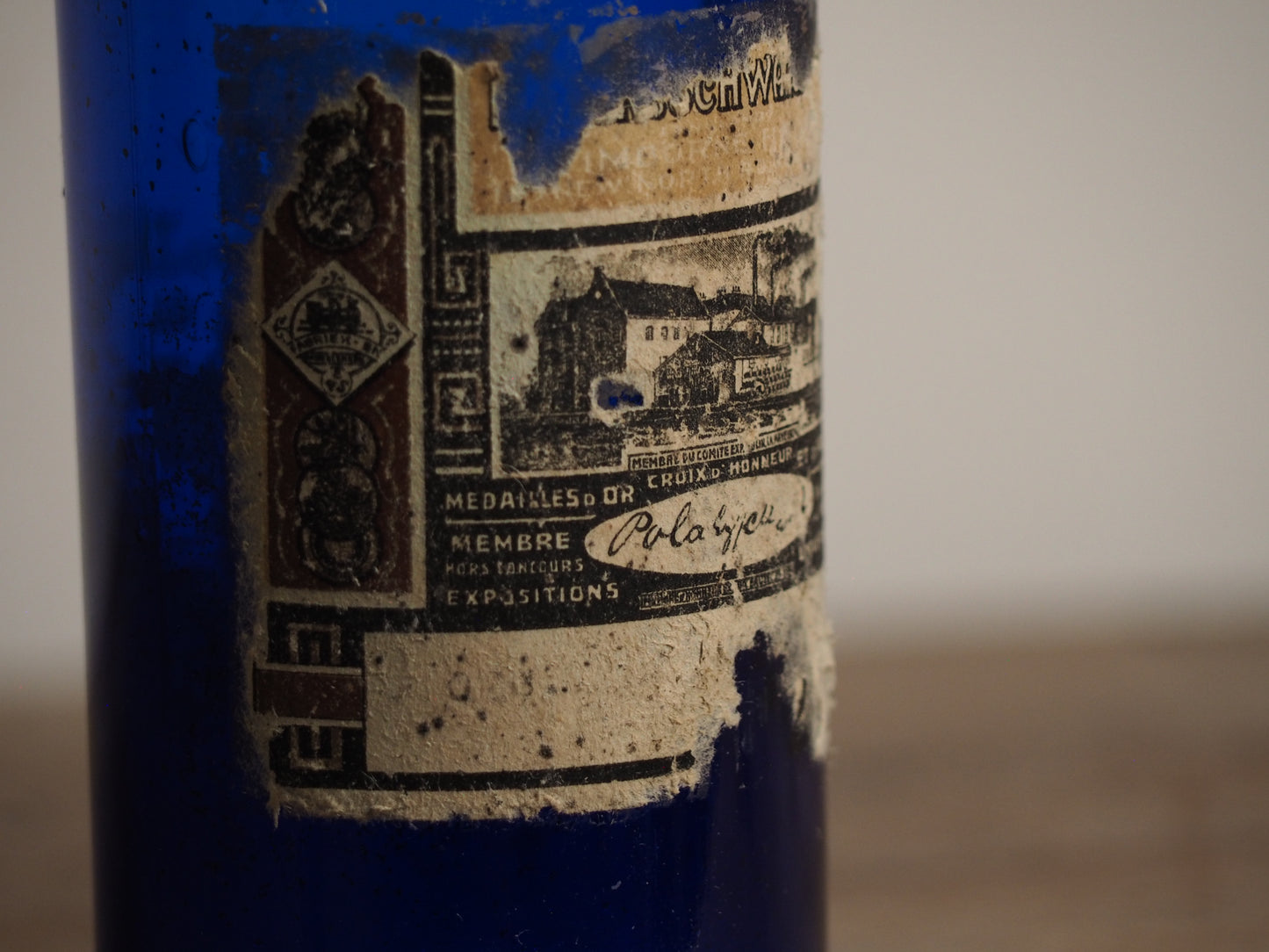 Antique Victorian Blue Glass Bottle with Stopper and Original Label