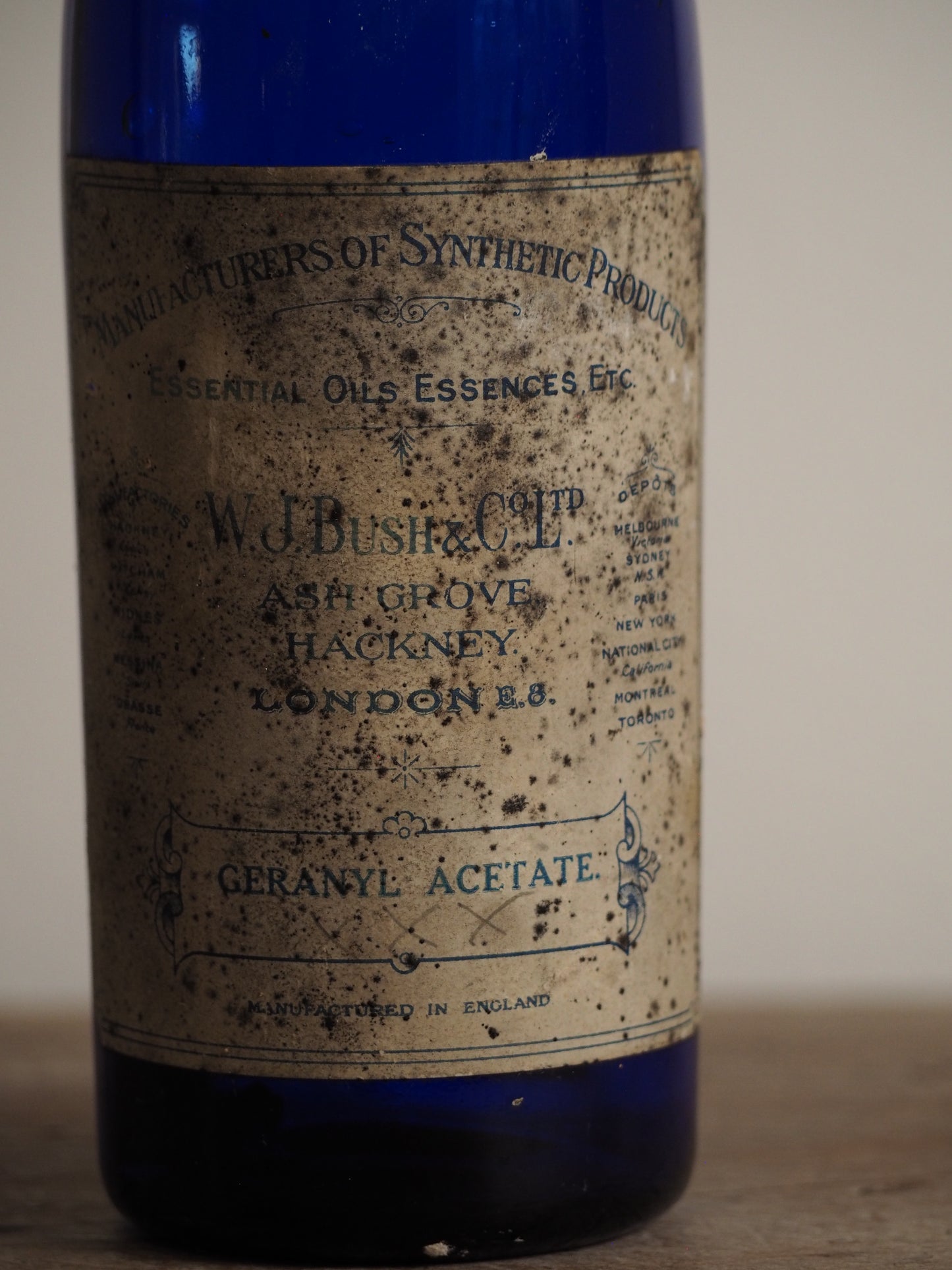 Antique Victorian Blue Glass Bottle with Stopper and Original Label