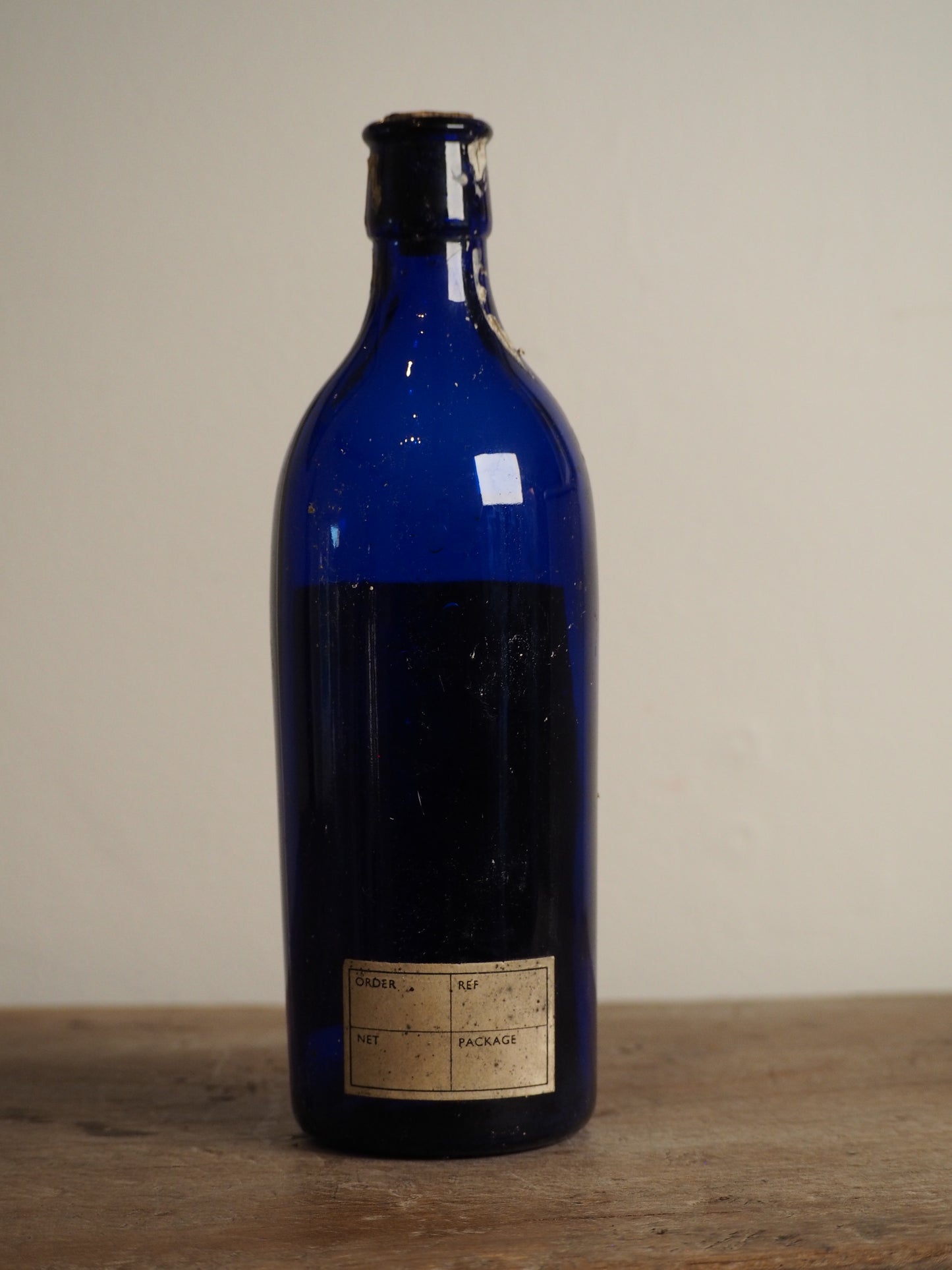 Antique Victorian Blue Glass Bottle with Stopper and Original Label