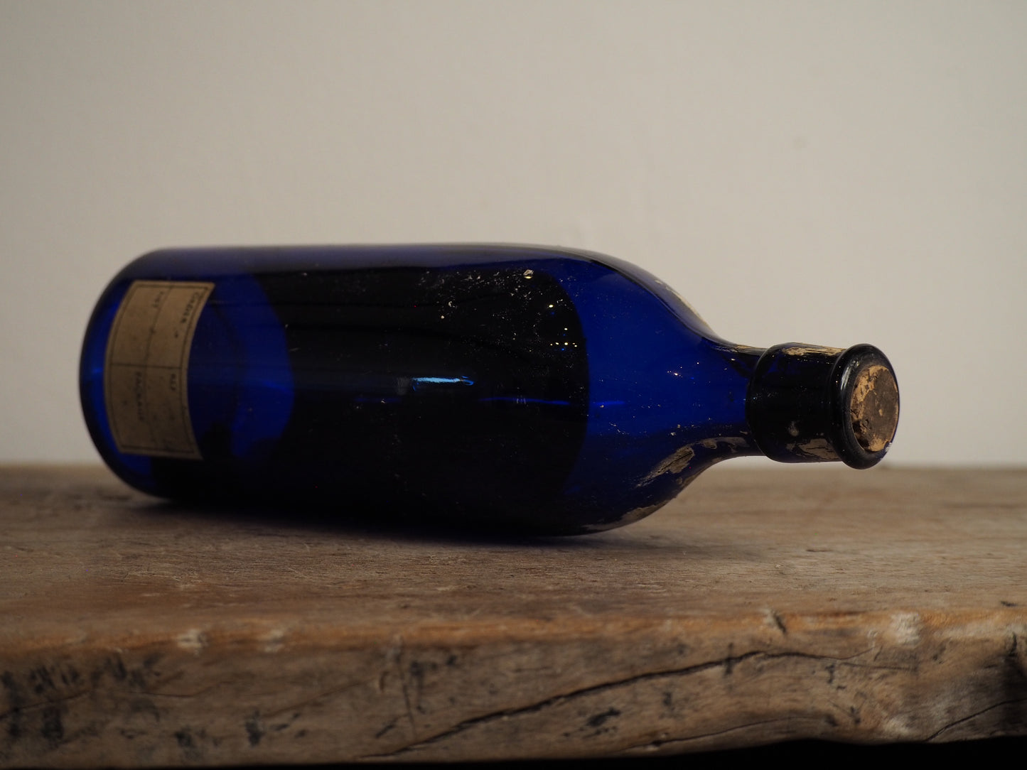 Antique Victorian Blue Glass Bottle with Stopper and Original Label