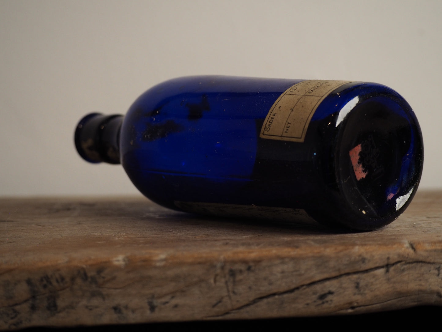 Antique Victorian Blue Glass Bottle with Stopper and Original Label